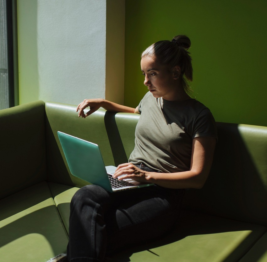 woman sitting with computer
